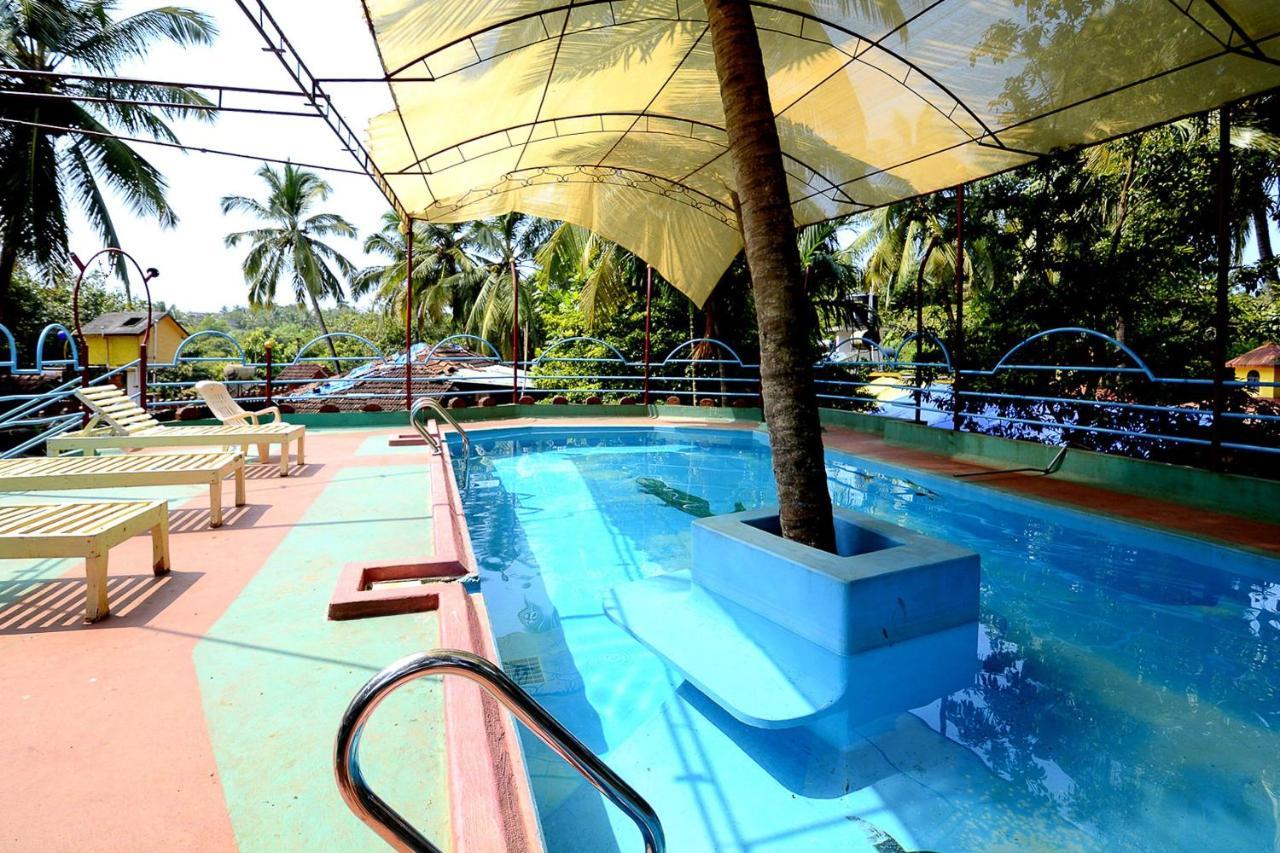Oyo 2440 Palm Grove Hotel Vagator Bagian luar foto